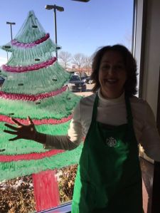 Barista Susan standing next to their EMPTY tree! Thank you to all the Starbucks customers in Golden Valley who participated in our Be A Santa to a Senior program!!!
